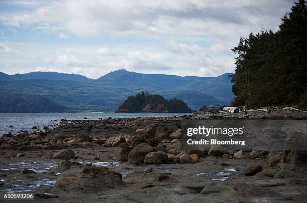 Rocks sit on the shore on the island of Haida Gwaii in British Columbia, Canada, on Friday, Aug. 26, 2016. Facing five major energy initiatives in...