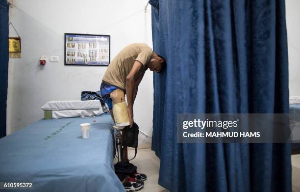 Mohannad Aid, a 20-year-old Palestinian who lost his leg when he was hit by a rocket during the 50-day war between Israel and Hamas militants in the...