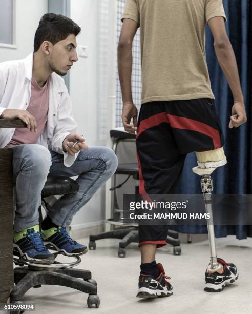 Mohannad Aid , a 20-year-old Palestinian who lost his leg when he was hit by a rocket during the 50-day war between Israel and Hamas militants in the...