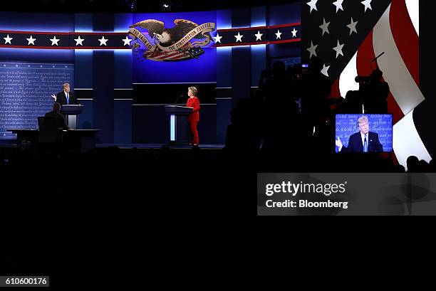 Donald Trump, 2016 Republican presidential nominee, speaks as Hillary Clinton, 2016 Democratic presidential nominee, listens during the first U.S....