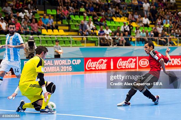 Goalkeeper Nicolas Sarmiento of Argentina clears a shot made by Ibrahim Eika of Egypt during the FIFA Futsal World Cup Quarter-Final match between...