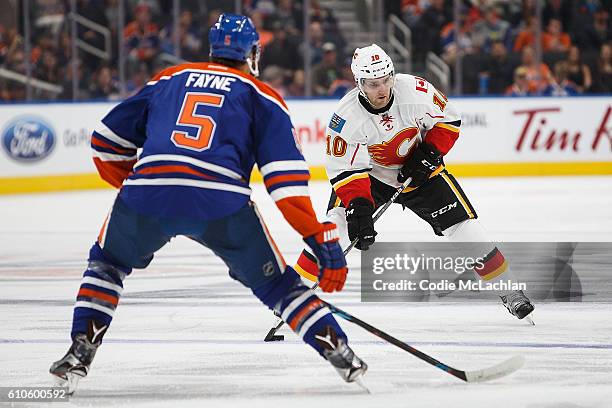 Mark Fayne of the Edmonton Oilers skates against Linden Vey of the Calgary Flames on September 26, 2016 at Rogers Place in Edmonton, Alberta, Canada.