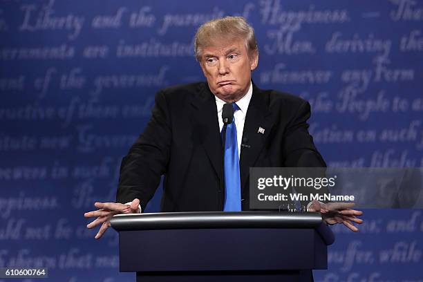 Republican presidential nominee Donald Trump looks on during the Presidential Debate at Hofstra University on September 26, 2016 in Hempstead, New...