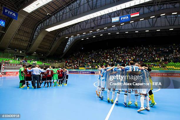 Players of Argentina celebrate after the FIFA Futsal World Cup Quarter-Final match between Argentina and Egypt at Coliseo Ivan de Bedout stadium on...