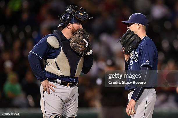Bobby Wilson speaks with Drew Smyly of the Tampa Bay Rays during the fifth inning of a game against the Chicago White Sox at U.S. Cellular Field on...