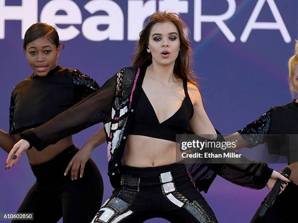 Actress/singer Hailee Steinfeld performs with a dancer during the 2016 Daytime Village at the iHeartRadio Music Festival at the Las Vegas Village on...