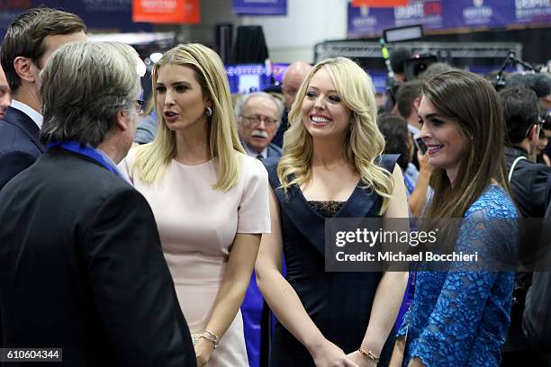 Republican presidential nominee Donald Trump's daughters, Ivanka Trump and Tiffany Trump stand with Hope Hicks in the spin room after the...