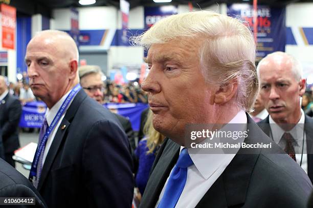 Republican presidential nominee Donald Trump speaks to the media in the spin room during the Presidential Debate at Hofstra University on September...