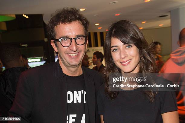 Cyrille Eldin and Sandrine Calvayrac attend the Fifa 17 Xperience Party at Le Cercle Cadet on September 26, 2016 in Paris, France.