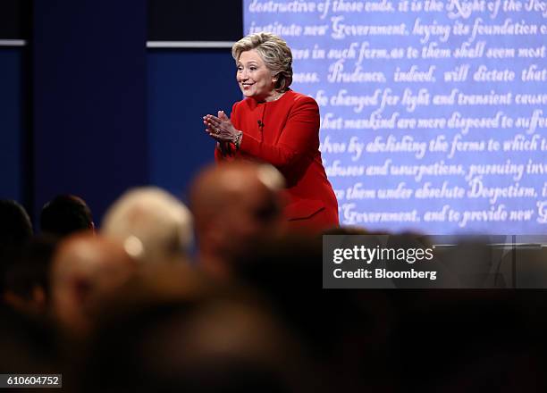 Hillary Clinton, 2016 Democratic presidential nominee, gestures to attendees after the first U.S. Presidential debate at Hofstra University in...