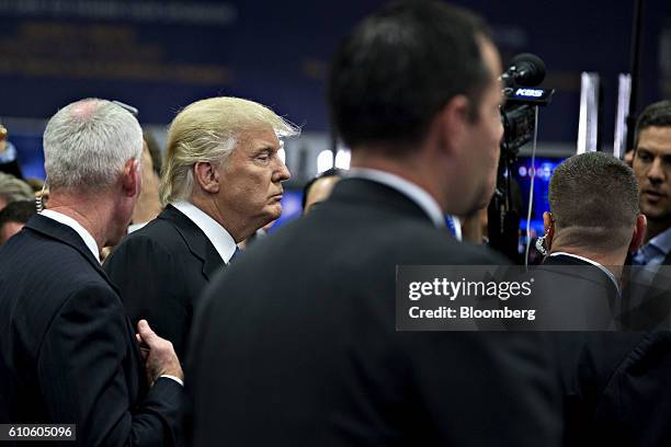 Donald Trump, 2016 Republican presidential nominee, speaks to the media following the first U.S. Presidential debate at Hofstra University in...