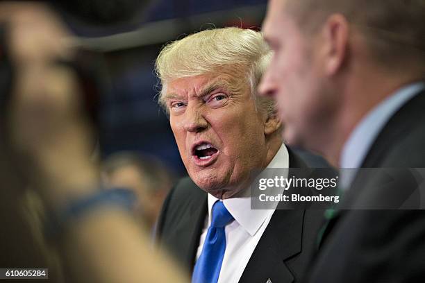 Donald Trump, 2016 Republican presidential nominee, speaks to the media following the first U.S. Presidential debate at Hofstra University in...