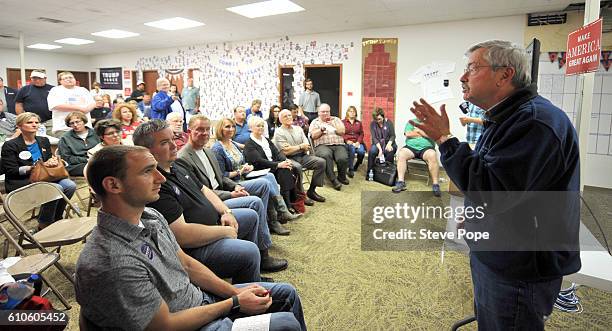 Iowa Gov. Terry Branstad talks to supporters of Republican Presidential candidate Donald Trump after the first of three presidential debates, on...