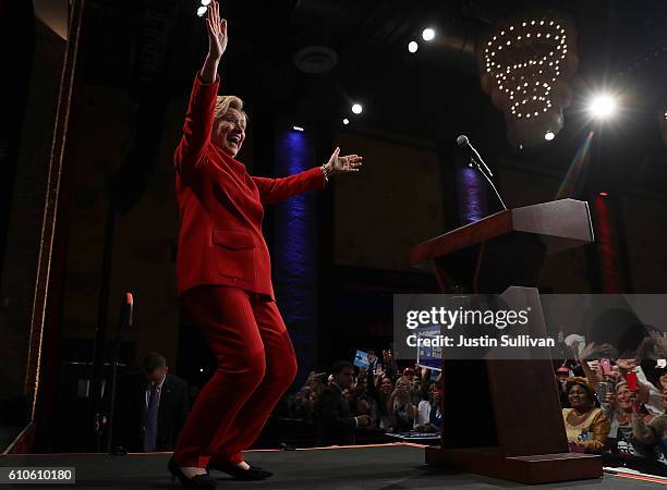 Democratic presidential nominee Hillary Clinton greets supporters during a debate-watch party at The Space at Westbury on September 26, 2016 in...