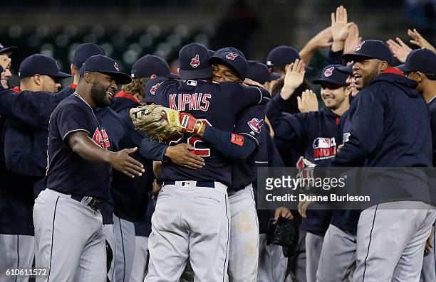 Rajai Davis of the Cleveland Indians hugs Jason Kipnis of the Cleveland Indians as they celebrate clinching the AL Central in a 7-4 win over the...