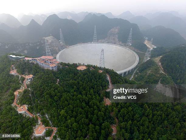 Aerial view of the Five-hundred-meter Aperture Spherical radio Telescope in operation on September 25, 2016 in Qiannan Buyei and Miao Autonomous...