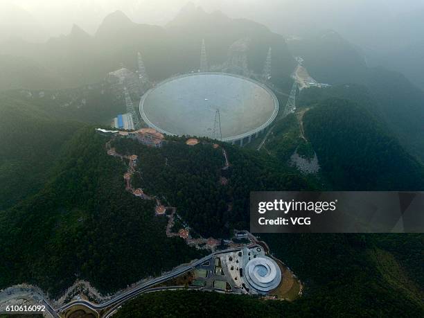 Aerial view of the Five-hundred-meter Aperture Spherical radio Telescope in operation on September 25, 2016 in Qiannan Buyei and Miao Autonomous...