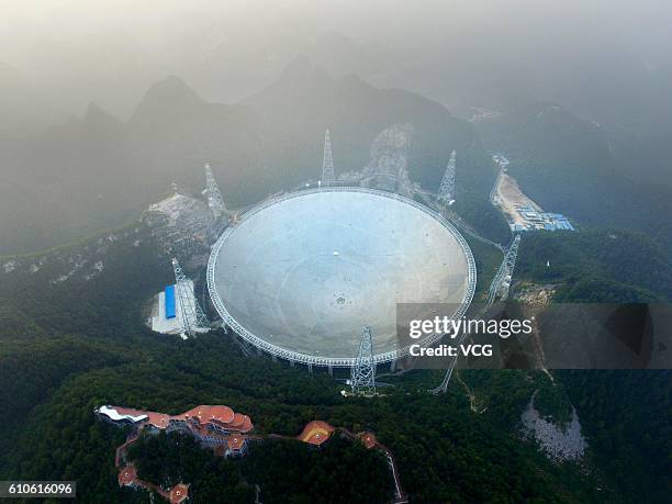 Aerial view of the Five-hundred-meter Aperture Spherical radio Telescope in operation on September 25, 2016 in Qiannan Buyei and Miao Autonomous...