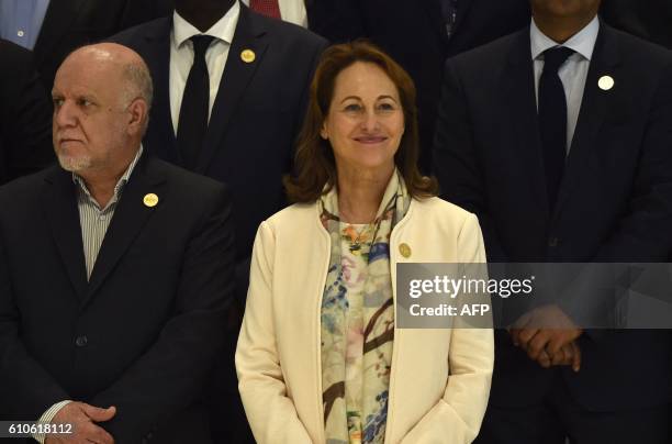 Iran's Minister of Petroleum, Bijan Namdar Zangeneh , and France's Environment Minister, Segolene Royal, pose for a group picture during the opening...