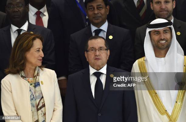 France's Environment Minister, Segolene Royal , Algerian Energy Minister Noureddine Boutarfa and Emirati Energy Minister Suhail al-Mazrouei pose for...