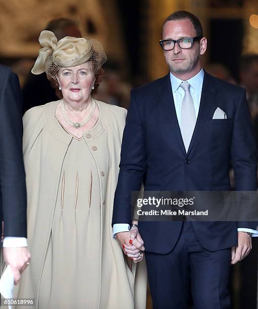 Helen Joyce Wogan with her son Mark attend a memorial service for the late Sir Terry Wogan at Westminster Abbey on September 27, 2016 in London,...