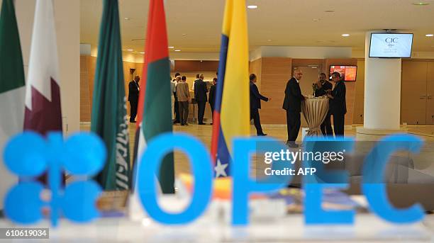 Participants attend the opening session of the 15th International Energy Forum in Algiers on September 27, 2016. Oil prices rose modestly ahead of a...