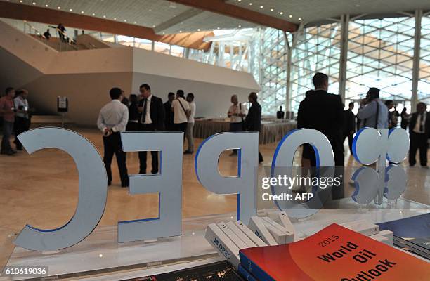 Participants attend the opening session of the 15th International Energy Forum in Algiers on September 27, 2016. Oil prices rose modestly ahead of a...