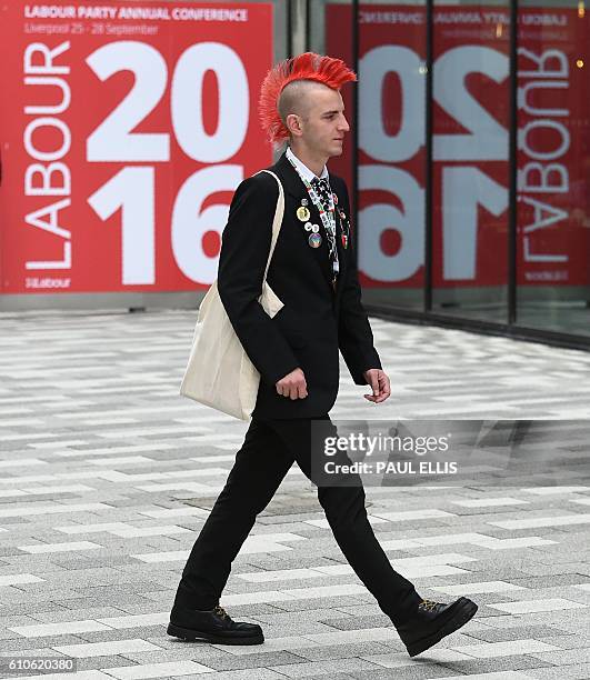 Delegate arrives for the third day of annual Labour Party conference in Liverpool, north west England on September 27, 2016. Distracted by a bitter...