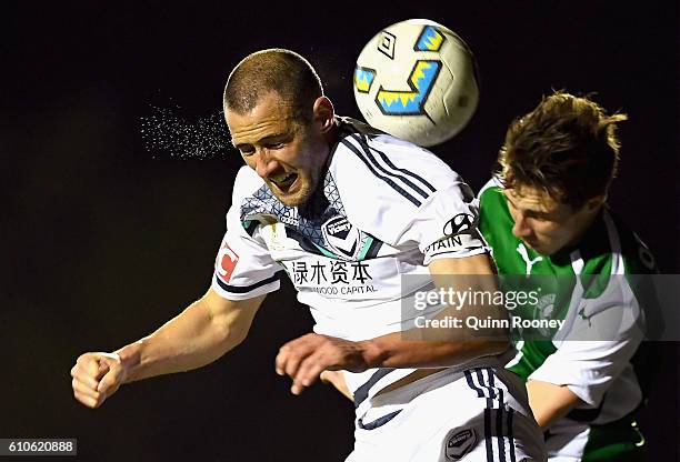 Carl Valeri of the Victory heads the ball during the FFA Cup match between Bentleigh Greens and Melbourne Victory at Kingston Heath Soccer Complex on...