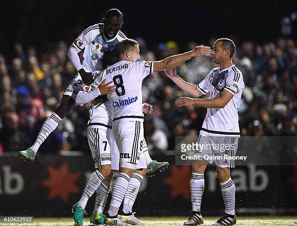 Marco Rojas of the Victory is congratulated by team mates after scoring a goal during the FFA Cup match between Bentleigh Greens and Melbourne...