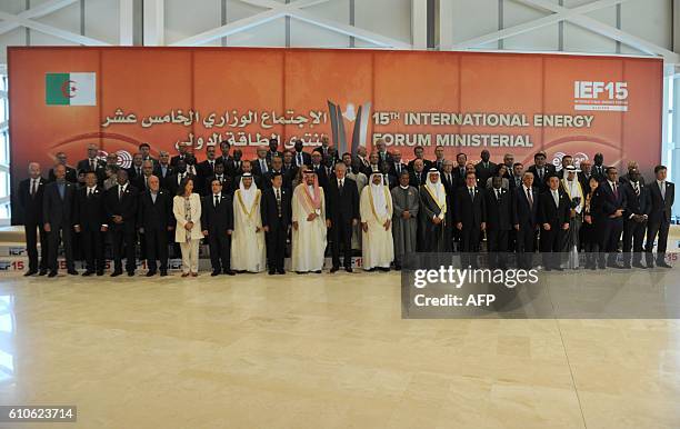 Algerian Prime Minister Abdelmalek Sellal poses with oil ministers from OPEC member states and other officials attending the opening session of the...