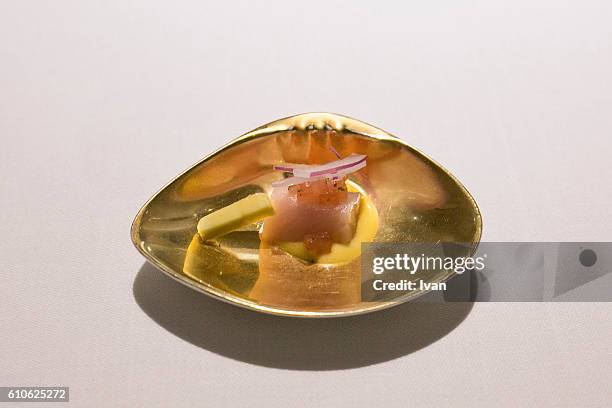 luxury molecular gastronomy, raw tuna with butter - dry ice black background stock pictures, royalty-free photos & images