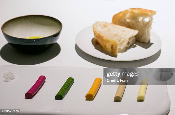 luxury molecular gastronomy, french bread served with various extra virgin olive oil and various butter - molecular gastronomy stock-fotos und bilder