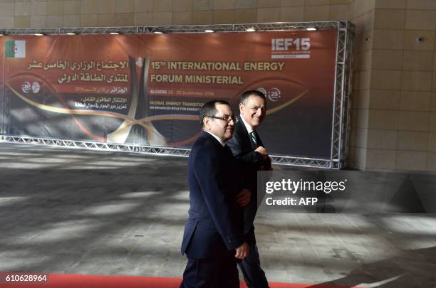 Algeria's Minister of Energy Noureddine Boutarfa , and Minister of Industry and Mining Abdeslam Bouchouareb arrive at the opening session of the 15th...