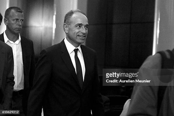 Jean-Francois Cope arrives to speak to voters during the Right-wing Opposition Party 'Les Republicains' primary elections meeting on September 27,...