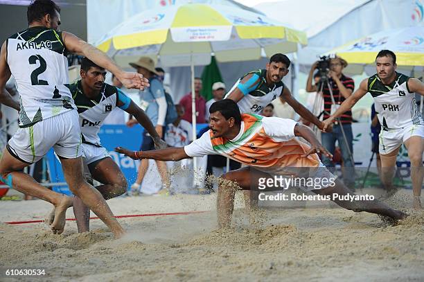 Pakistan team compete against India team during Beach Kabaddi Men's final match on day four of the 5th Asian Beach Games 2016 at Bien Dong Park, Pham...