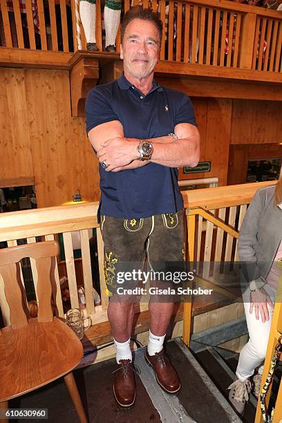 Arnold Schwarzenegger visits the Schuetzen Festzelt during the Oktoberfest at Theresienwiese on September 27, 2016 in Munich, Germany.