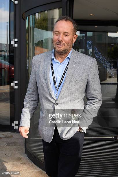 Former Labour politician Derek Hatton leaves a restaurant after meeting Len McLuskey of Unite the Union during the Labour Party conference on...