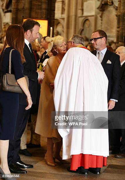 Lady Helen Wogan, the widow of Sir Terry Wogan, and their children Katerine, Alan and Mark talk with the Very Reverend John Hall, Dean of...