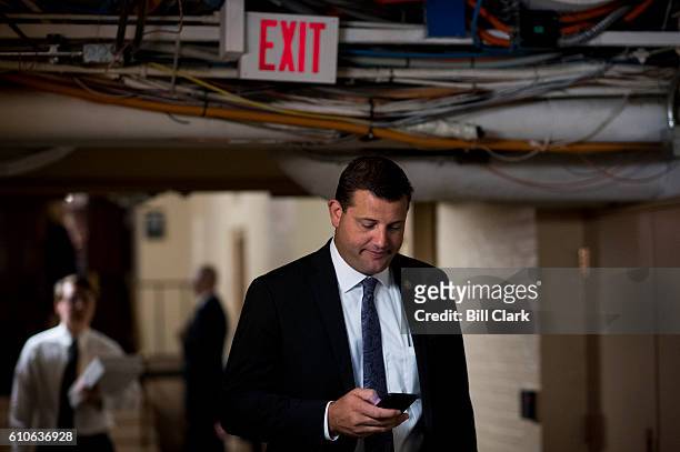 Rep. David Valadao, R-Calif., leaves the House Republican Conference meeting in the Capitol on Tuesday, Sept. 27, 2016.