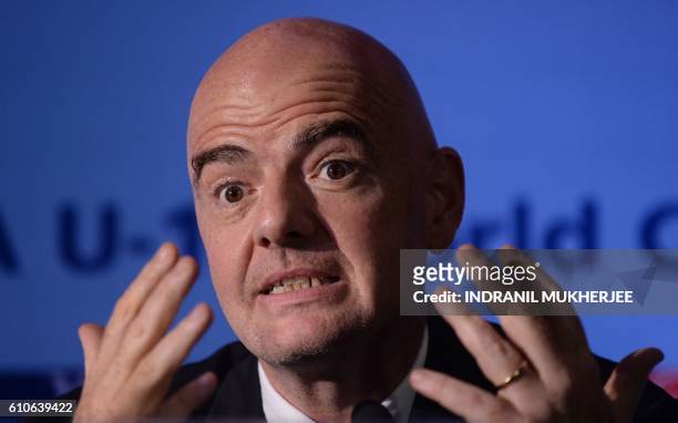 President Gianni Infantino speaks at a press conference in Panjim on September 27, 2016. - Infantino, who was in Goa to attend the Asian Football...