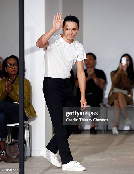 Designer Olivier Theysen acknowledges the audience at the end of his Womenswear Spring/Summer 2017 show on September 27, 2016 in Paris, France.