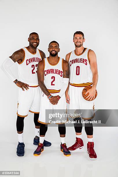 LeBron James, Kyrie Irving and Kevin Love of the Cleveland Cavaliers poses for a portrait during 2016-2017 Cleveland Cavaliers Media Day at the...