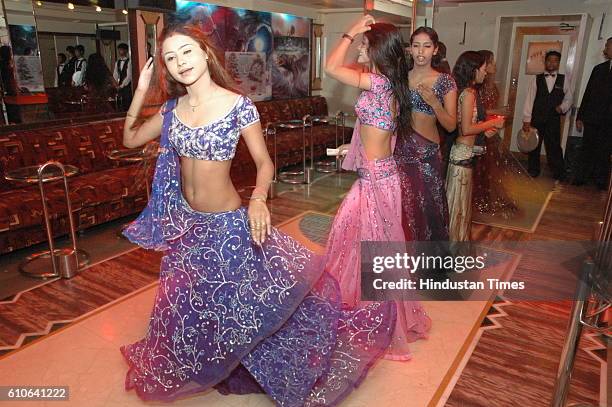 Bars and Restaurants - Bar Dancers - Bar girls entertain customers in a dance bar at Andheri West .