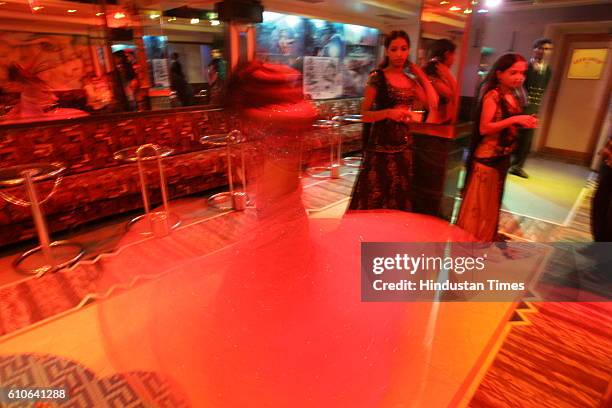 Bars and Restaurants - Bar Dancers - Bar girls entertain customers in a dance bar at Andheri West .