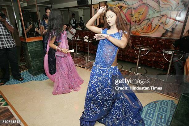 Bars and Restaurants - Bar Dancers - Bar girls entertain customers in a dance bar at Andheri West .