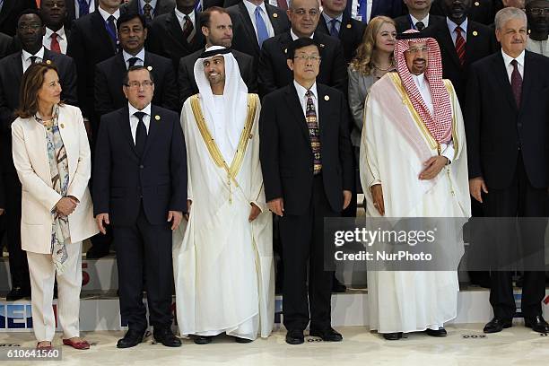 France's Environment Minister, Segolene Royal, Algerian Energy Minister Noureddine Boutarfa and Emirati Energy Minister Suhail al-Mazrouei pose for a...