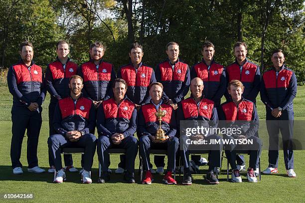 Team poses for pictures at Hazeltine National Golf Course in Chaska, Minnesota, September 27 ahead of the 41st Ryder Cup. Ryan Moore, Zach Johnson,...