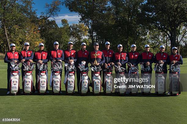 Team poses for pictures at Hazeltine National Golf Course in Chaska, Minnesota, September 27 ahead of the 41st Ryder Cup. Ryan Moore, Zach Johnson,...
