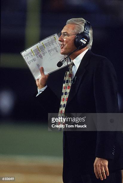 Head Coach John Mackovic of the Arizona Wildcats calling out to his players on the field during the game against the San Diego State Aztecs at...